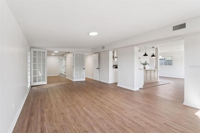 One or more photo(s) has been virtually stagedpletely remodeled on Country Club of Orlando in Florida - for sale on GolfHomes.com, golf home, golf lot