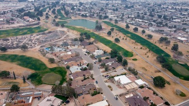 Custom home on 2 - lots along the 2nd fairway on Horizon Golf on Emerald Springs Golf Course in Texas - for sale on GolfHomes.com, golf home, golf lot