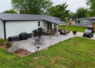 3 LOTS!!! The 3br 2 Ba updated in Rustic decor home is located on Linn Valley Lakes - Deer Trace Golf Course in Kansas - for sale on GolfHomes.com, golf home, golf lot