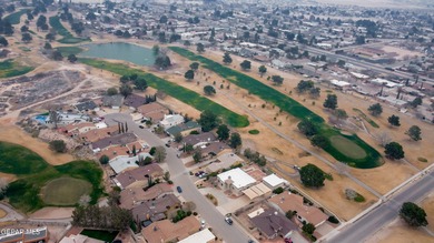 Custom home on 2 - lots along the 2nd fairway on Horizon Golf on Emerald Springs Golf Course in Texas - for sale on GolfHomes.com, golf home, golf lot