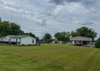 3 LOTS!!! The 3br 2 Ba updated in Rustic decor home is located on Linn Valley Lakes - Deer Trace Golf Course in Kansas - for sale on GolfHomes.com, golf home, golf lot