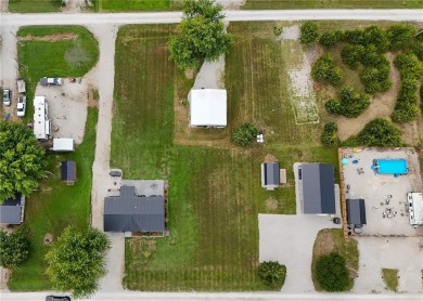 3 LOTS!!! The 3br 2 Ba updated in Rustic decor home is located on Linn Valley Lakes - Deer Trace Golf Course in Kansas - for sale on GolfHomes.com, golf home, golf lot