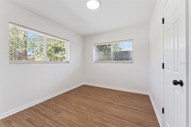 One or more photo(s) has been virtually stagedpletely remodeled on Country Club of Orlando in Florida - for sale on GolfHomes.com, golf home, golf lot