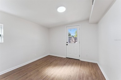 One or more photo(s) has been virtually stagedpletely remodeled on Country Club of Orlando in Florida - for sale on GolfHomes.com, golf home, golf lot