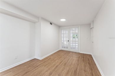 One or more photo(s) has been virtually stagedpletely remodeled on Country Club of Orlando in Florida - for sale on GolfHomes.com, golf home, golf lot