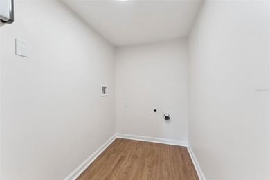 One or more photo(s) has been virtually stagedpletely remodeled on Country Club of Orlando in Florida - for sale on GolfHomes.com, golf home, golf lot
