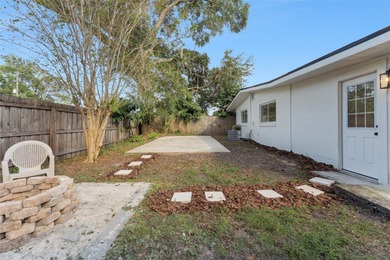 One or more photo(s) has been virtually stagedpletely remodeled on Country Club of Orlando in Florida - for sale on GolfHomes.com, golf home, golf lot