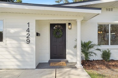 One or more photo(s) has been virtually stagedpletely remodeled on Country Club of Orlando in Florida - for sale on GolfHomes.com, golf home, golf lot