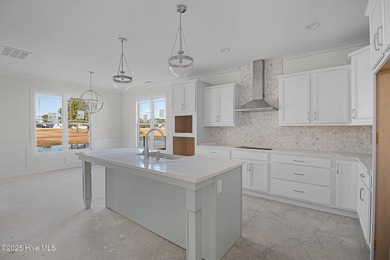 Situated on the golf course in Beaufort Club, 111 Windswept Lane on North River Club in North Carolina - for sale on GolfHomes.com, golf home, golf lot