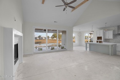 Situated on the golf course in Beaufort Club, 111 Windswept Lane on North River Club in North Carolina - for sale on GolfHomes.com, golf home, golf lot