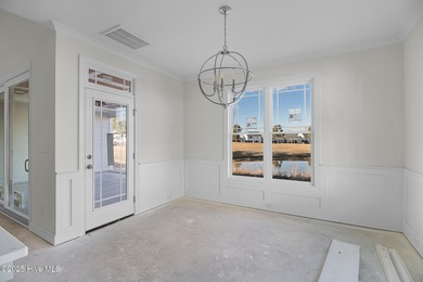 Situated on the golf course in Beaufort Club, 111 Windswept Lane on North River Club in North Carolina - for sale on GolfHomes.com, golf home, golf lot