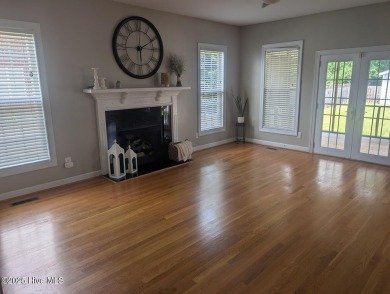 This four bedrooom, two and a half bath has everything you could on Rock Creek Country Club in North Carolina - for sale on GolfHomes.com, golf home, golf lot