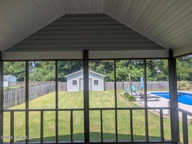 This four bedrooom, two and a half bath has everything you could on Rock Creek Country Club in North Carolina - for sale on GolfHomes.com, golf home, golf lot