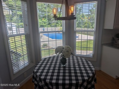 This four bedrooom, two and a half bath has everything you could on Rock Creek Country Club in North Carolina - for sale on GolfHomes.com, golf home, golf lot