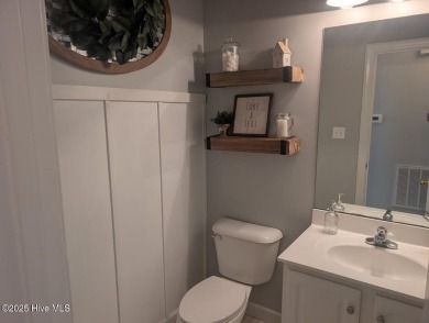 This four bedrooom, two and a half bath has everything you could on Rock Creek Country Club in North Carolina - for sale on GolfHomes.com, golf home, golf lot