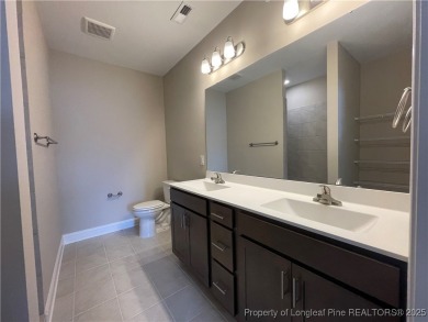 This beautiful three bedroom, two bathroom luxury condo in on Anderson Creek Golf Club in North Carolina - for sale on GolfHomes.com, golf home, golf lot