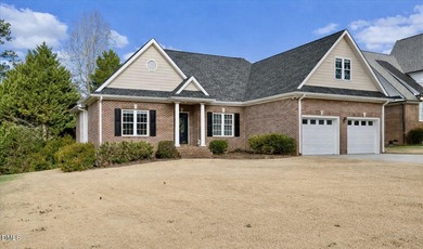 Exceptionally well-maintained all-brick home offering a spacious on Henderson Country Club in North Carolina - for sale on GolfHomes.com, golf home, golf lot