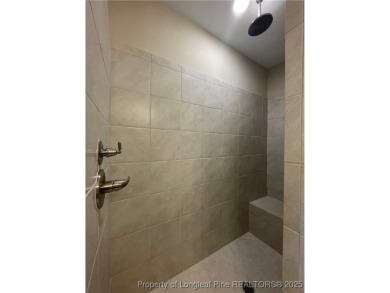 This beautiful three bedroom, two bathroom luxury condo in on Anderson Creek Golf Club in North Carolina - for sale on GolfHomes.com, golf home, golf lot