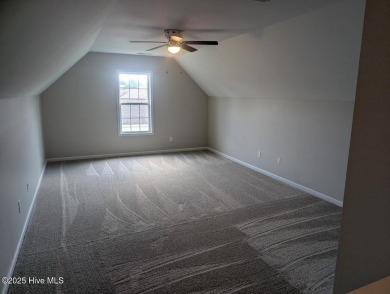This four bedrooom, two and a half bath has everything you could on Rock Creek Country Club in North Carolina - for sale on GolfHomes.com, golf home, golf lot