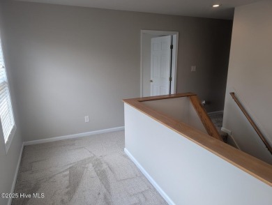 This four bedrooom, two and a half bath has everything you could on Rock Creek Country Club in North Carolina - for sale on GolfHomes.com, golf home, golf lot