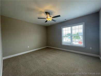 This beautiful three bedroom, two bathroom luxury condo in on Anderson Creek Golf Club in North Carolina - for sale on GolfHomes.com, golf home, golf lot