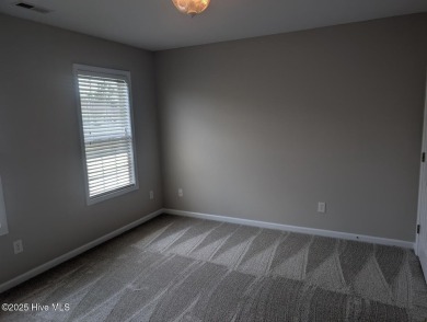 This four bedrooom, two and a half bath has everything you could on Rock Creek Country Club in North Carolina - for sale on GolfHomes.com, golf home, golf lot
