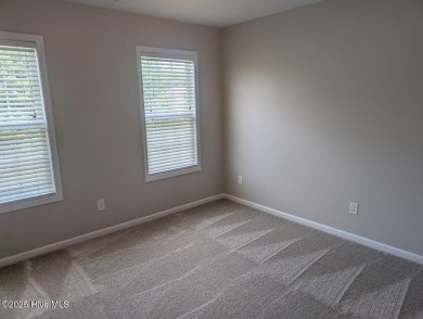 This four bedrooom, two and a half bath has everything you could on Rock Creek Country Club in North Carolina - for sale on GolfHomes.com, golf home, golf lot