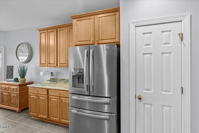 Exceptionally well-maintained all-brick home offering a spacious on Henderson Country Club in North Carolina - for sale on GolfHomes.com, golf home, golf lot