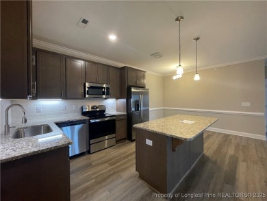 This beautiful three bedroom, two bathroom luxury condo in on Anderson Creek Golf Club in North Carolina - for sale on GolfHomes.com, golf home, golf lot