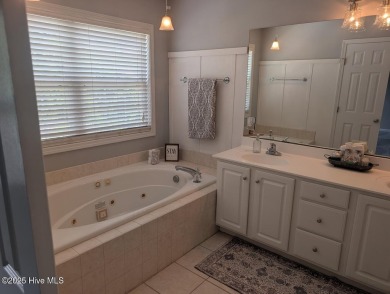 This four bedrooom, two and a half bath has everything you could on Rock Creek Country Club in North Carolina - for sale on GolfHomes.com, golf home, golf lot
