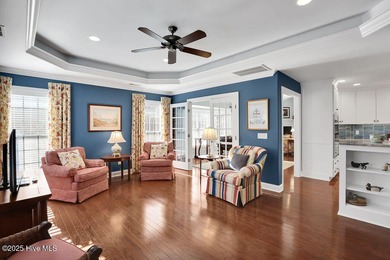 Serene nature views await you in this stunning brick home on Cape Fear National At Brunswick Forest in North Carolina - for sale on GolfHomes.com, golf home, golf lot