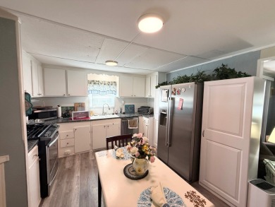 THIS HOME IS A STEAL!! FURNISHED AS-IS AND WONT LAST LONG!!! on Lone Palm Golf Club in Florida - for sale on GolfHomes.com, golf home, golf lot