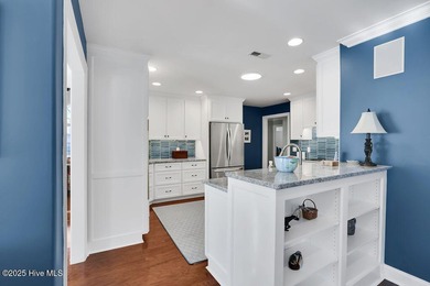 Serene nature views await you in this stunning brick home on Cape Fear National At Brunswick Forest in North Carolina - for sale on GolfHomes.com, golf home, golf lot