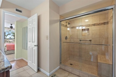 This light and bright 2nd floor condo in Bahia Vista has on Isla Del Sol Yacht and Country Club in Florida - for sale on GolfHomes.com, golf home, golf lot