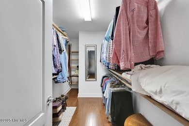 Serene nature views await you in this stunning brick home on Cape Fear National At Brunswick Forest in North Carolina - for sale on GolfHomes.com, golf home, golf lot