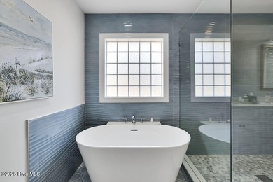 Serene nature views await you in this stunning brick home on Cape Fear National At Brunswick Forest in North Carolina - for sale on GolfHomes.com, golf home, golf lot