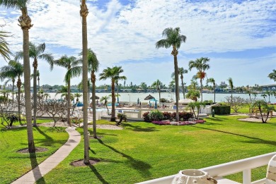 This light and bright 2nd floor condo in Bahia Vista has on Isla Del Sol Yacht and Country Club in Florida - for sale on GolfHomes.com, golf home, golf lot