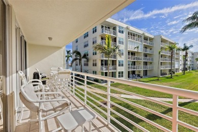 This light and bright 2nd floor condo in Bahia Vista has on Isla Del Sol Yacht and Country Club in Florida - for sale on GolfHomes.com, golf home, golf lot