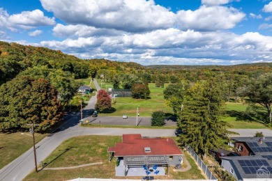 Stylish Mid-Century overlooking the Catskill Golf Course. This on Catskill Golf Club in New York - for sale on GolfHomes.com, golf home, golf lot