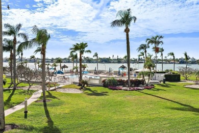 This light and bright 2nd floor condo in Bahia Vista has on Isla Del Sol Yacht and Country Club in Florida - for sale on GolfHomes.com, golf home, golf lot