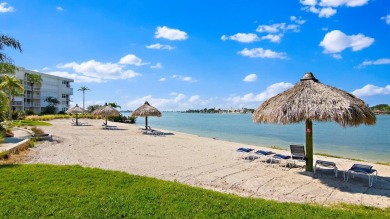 This light and bright 2nd floor condo in Bahia Vista has on Isla Del Sol Yacht and Country Club in Florida - for sale on GolfHomes.com, golf home, golf lot