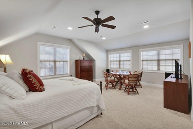 Serene nature views await you in this stunning brick home on Cape Fear National At Brunswick Forest in North Carolina - for sale on GolfHomes.com, golf home, golf lot