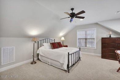 Serene nature views await you in this stunning brick home on Cape Fear National At Brunswick Forest in North Carolina - for sale on GolfHomes.com, golf home, golf lot