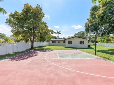 4-bedroom, 3-bathroom single-family oasis in the coveted Country on Fort Lauderdale Country Club in Florida - for sale on GolfHomes.com, golf home, golf lot