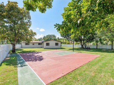 4-bedroom, 3-bathroom single-family oasis in the coveted Country on Fort Lauderdale Country Club in Florida - for sale on GolfHomes.com, golf home, golf lot