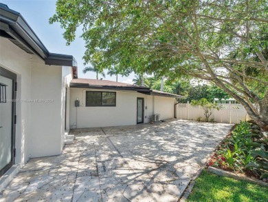 4-bedroom, 3-bathroom single-family oasis in the coveted Country on Fort Lauderdale Country Club in Florida - for sale on GolfHomes.com, golf home, golf lot