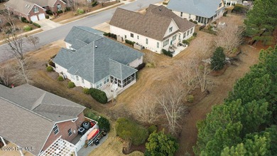 Serene nature views await you in this stunning brick home on Cape Fear National At Brunswick Forest in North Carolina - for sale on GolfHomes.com, golf home, golf lot