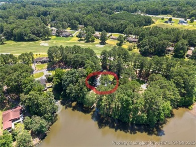 Incredible waterfront home located within the gated community of on Carolina Trace Country Club in North Carolina - for sale on GolfHomes.com, golf home, golf lot