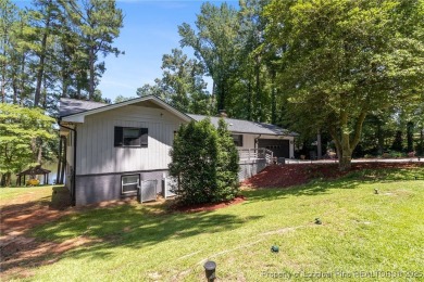 Incredible waterfront home located within the gated community of on Carolina Trace Country Club in North Carolina - for sale on GolfHomes.com, golf home, golf lot