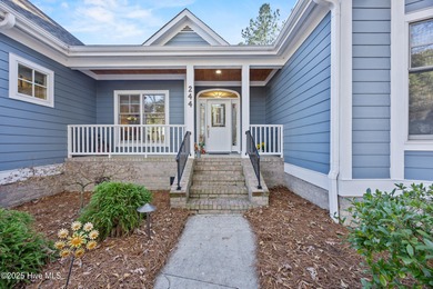 Set within the picturesque River Landing golf community, this on River Landing Golf Course in North Carolina - for sale on GolfHomes.com, golf home, golf lot